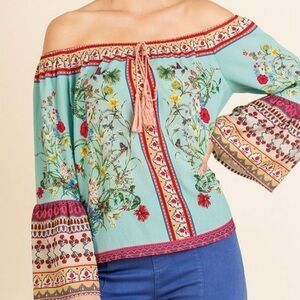 [L]Umgee Off Shoulder floral print top with Bell Sleeves and Drawstring.